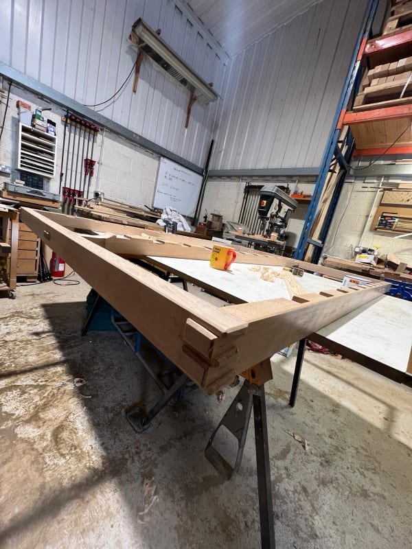 Bespoke occasional table with turned legs taking shape in the workshop